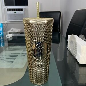 Gold Starbucks cup